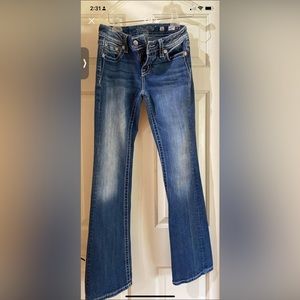 Miss me jeans bootcut one pair are a 27 and the other 2 are 26’s. Gently worn.